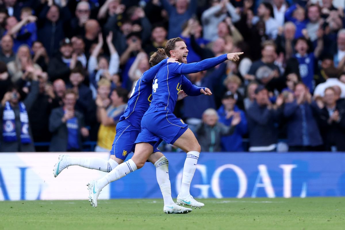Jordan Henderson and Cole Palmer celebrate the former's second goal against Bournemouth