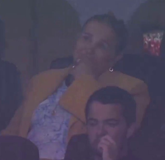 His 69-year-old mother, Dolores Aveiro (top) was seen crying in the stands after Ronaldo's miss