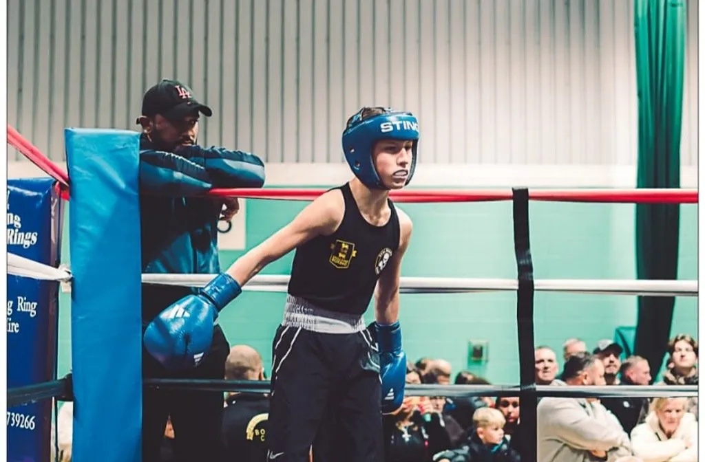 Young boxer, Mushy Fletcher in the ring at the Stoke Mandeville Centre in Aylesbury
