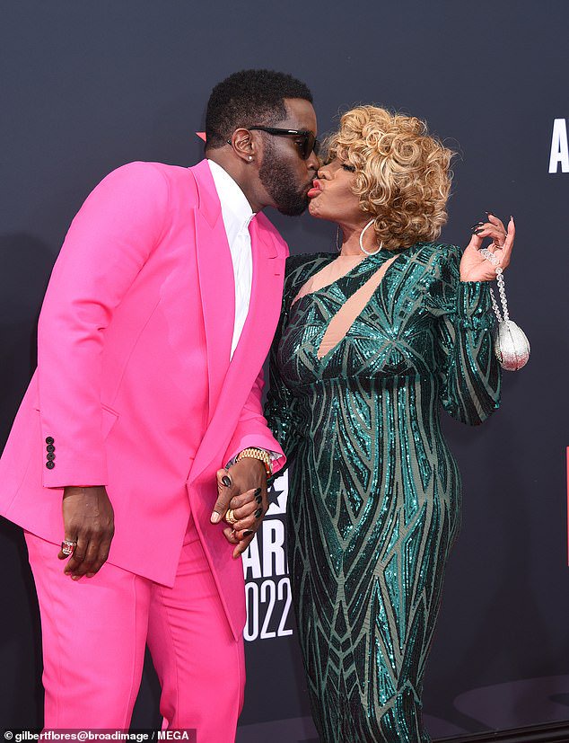 Psychologists suggest that growing up without a father figure likely influenced Diddy's 'drive for power'. Diddy is pictured with his mother Janice Combs in June 2022