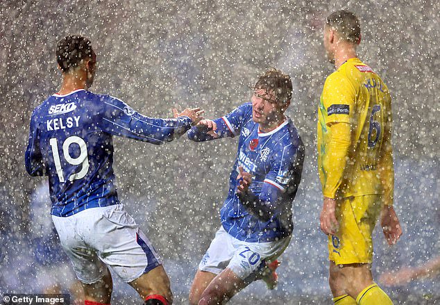 Rangers striker Ryan Naderi celebrates scoring in their storm-hit victory over St Johnstone