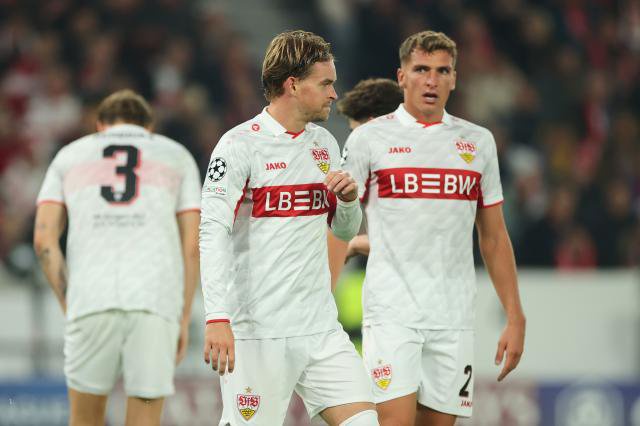 Maximilian Mittelstädt and Grischa Prömel in action for VfB Stuttgart against Atletico Madrid.