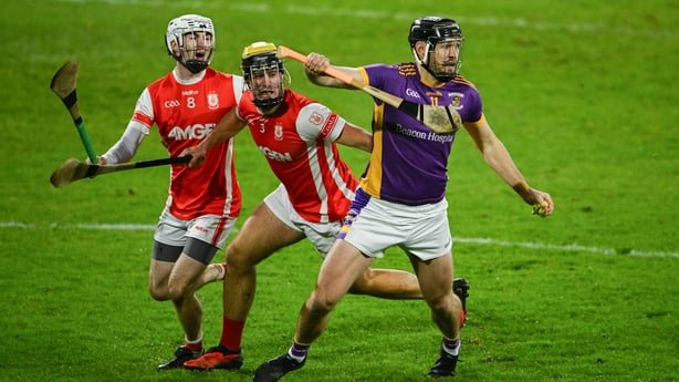 24 October 2026; Ronan Hayes of Kilmacud Crokes in action against Donal O'Shea, left, and Aodhan English of Cuala during the PTSB Dublin County Senior Club Hurling Championship final match between Cuala and Kilmacud Crokes at Parnell Park in Dublin. Photo by Ben McShane/Sportsfile 