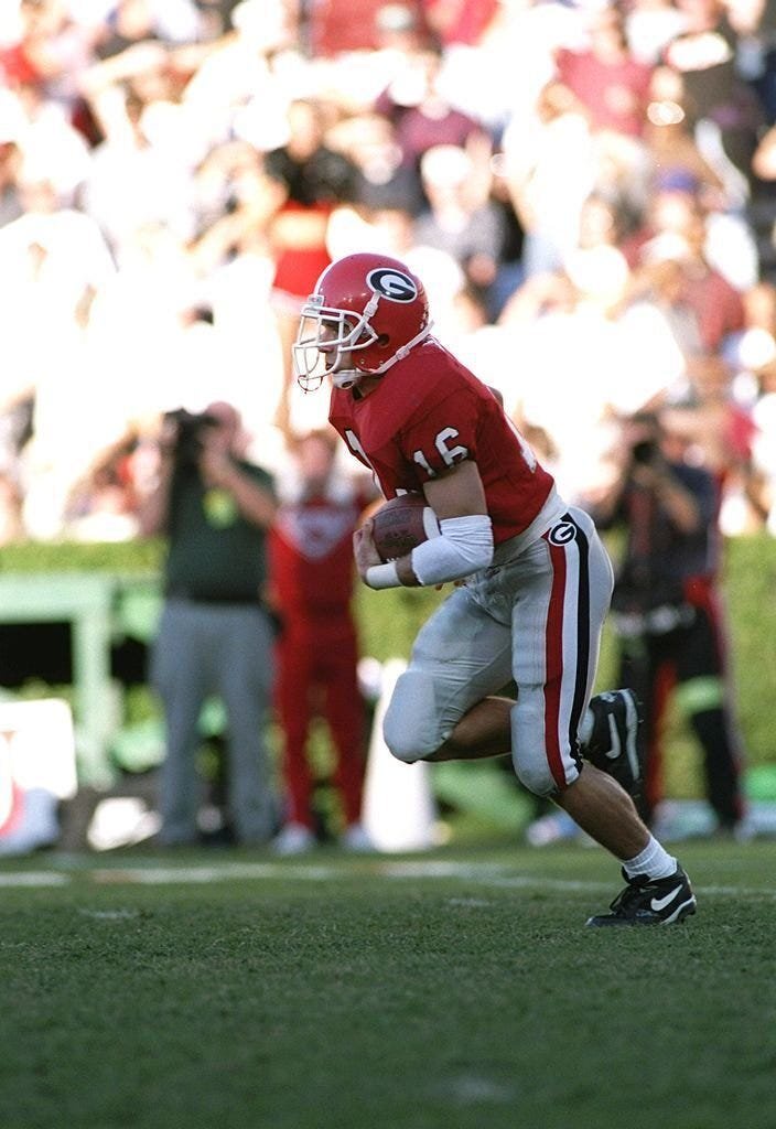 University of Georgia coach Kirby Smart returns a punt when he played for the Bulldogs during the 1995 game in Athens, Ga., against the Florida Gators.