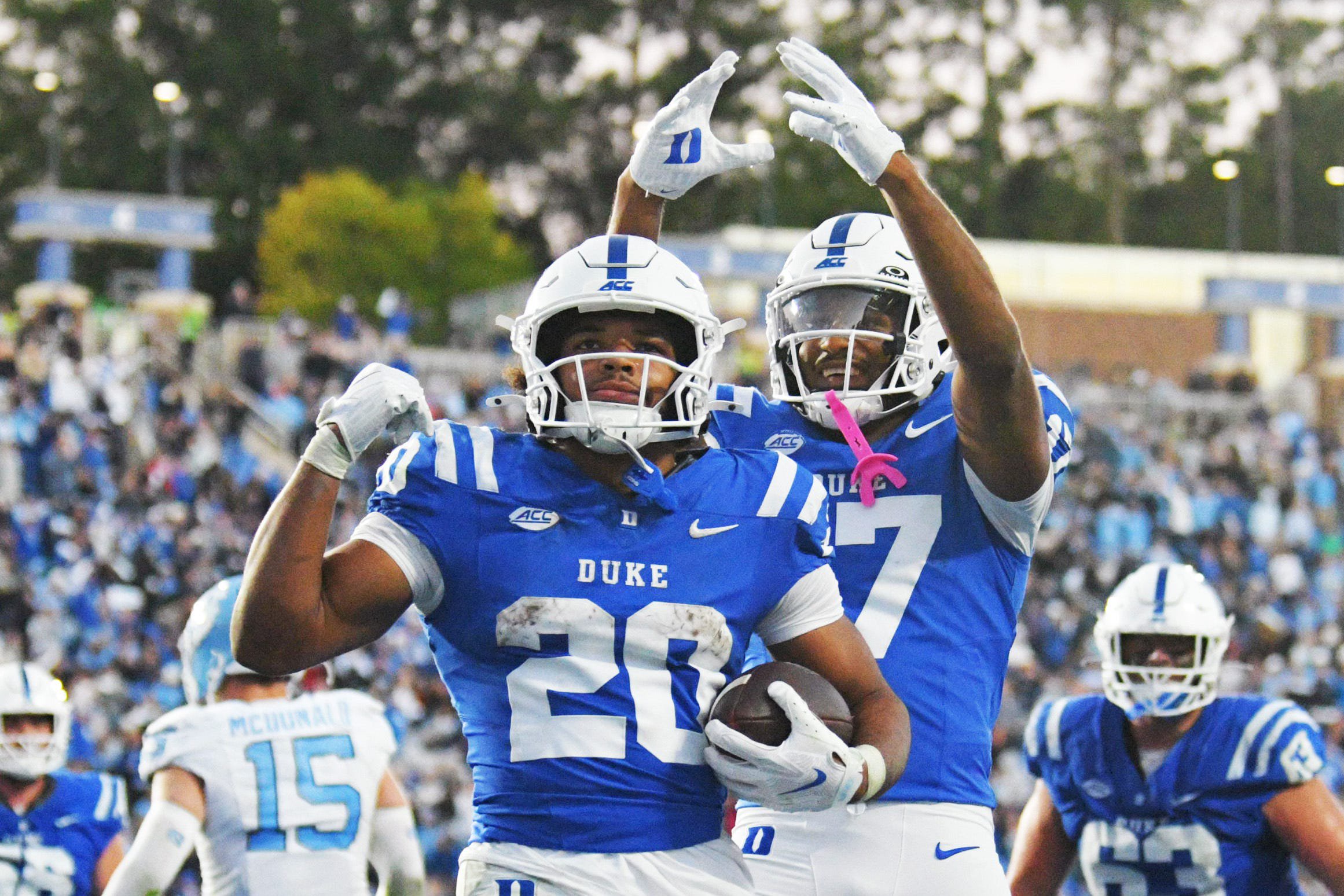 Oct 17, 2026; Durham, North Carolina, USA;  Duke Blue Devils running back Nate Sheppard (20) celebrates his touchdown during the fourth quarter against the North Carolina Tar Heels with Duke Blue Devils wide receiver Jared Richardson (17) at Wallace Wade Stadium.  Mandatory Credit: Zachary Taft-Imagn Images