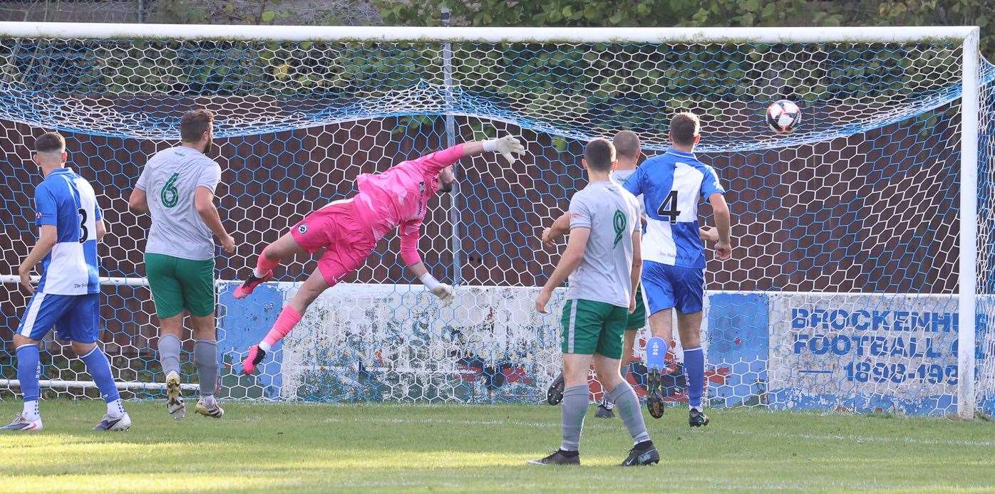 Brockenhurst keeper Jordi Valero could do nothing to stop Hamble Club's third goal (Photo: @JustinParryPho1)