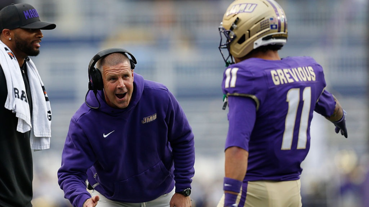 Billy Napier congratulates Noah Grevious after scoring a touchdown.