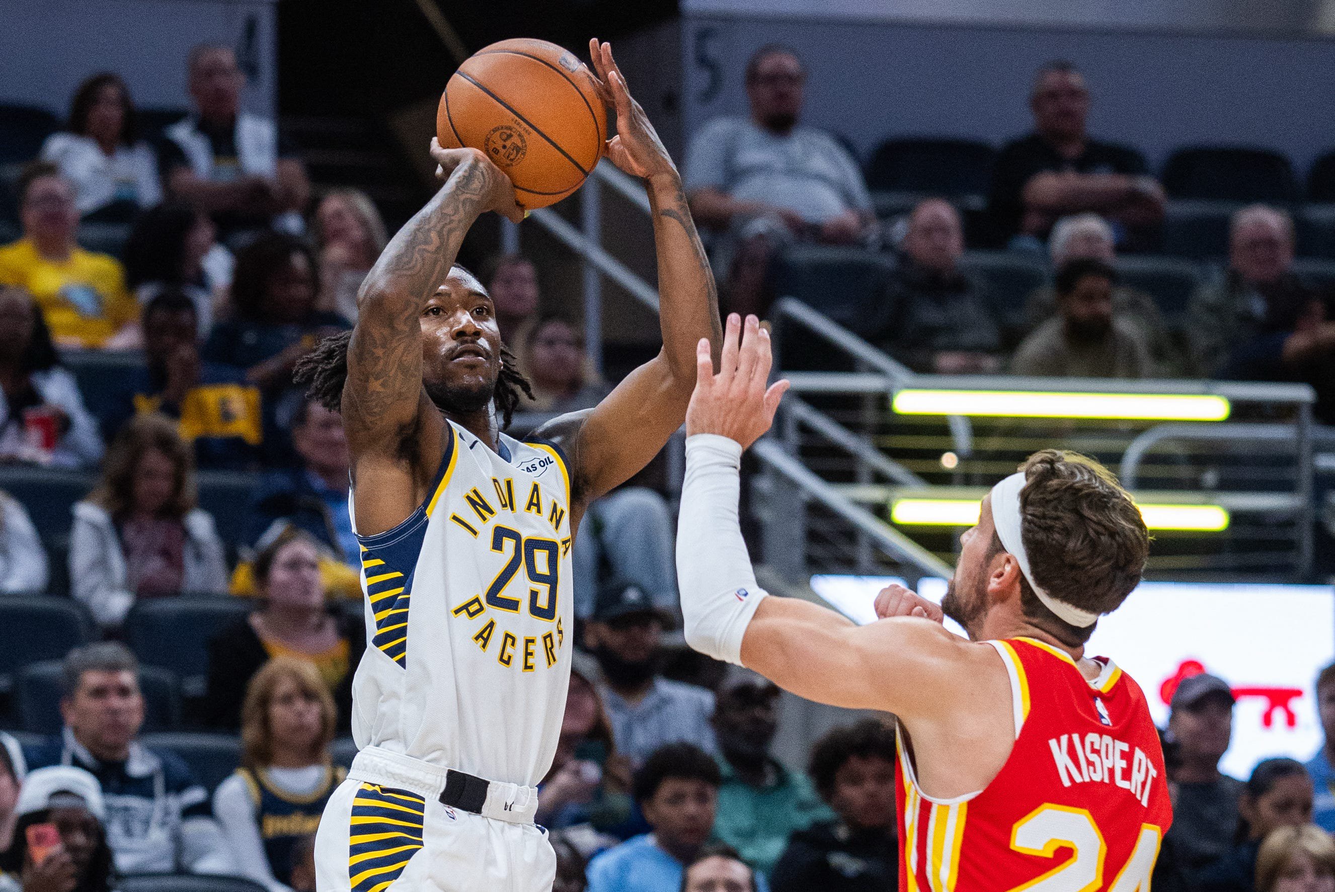 Oct 10, 2026; Indianapolis, Indiana, USA;  Indiana Pacers guard Quenton Jackson (29) shoots the ball while Atlanta Hawks forward Corey Kispert (24) defends in the first half at Gainbridge Fieldhouse.  Mandatory Credit: Trevor Ruszkowski-Imagn Images