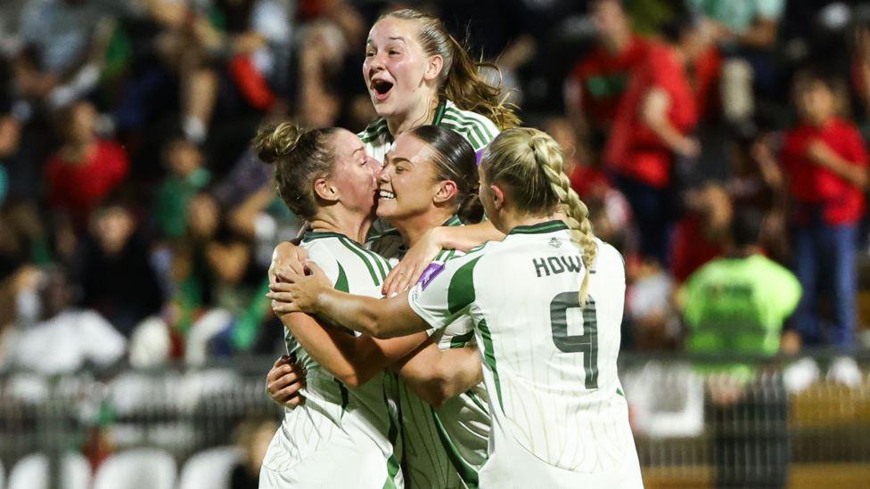 Casey Howe, Rebecca Holloway, Aimee Kerr and Kess Elmore celebrating Northern Ireland's goal