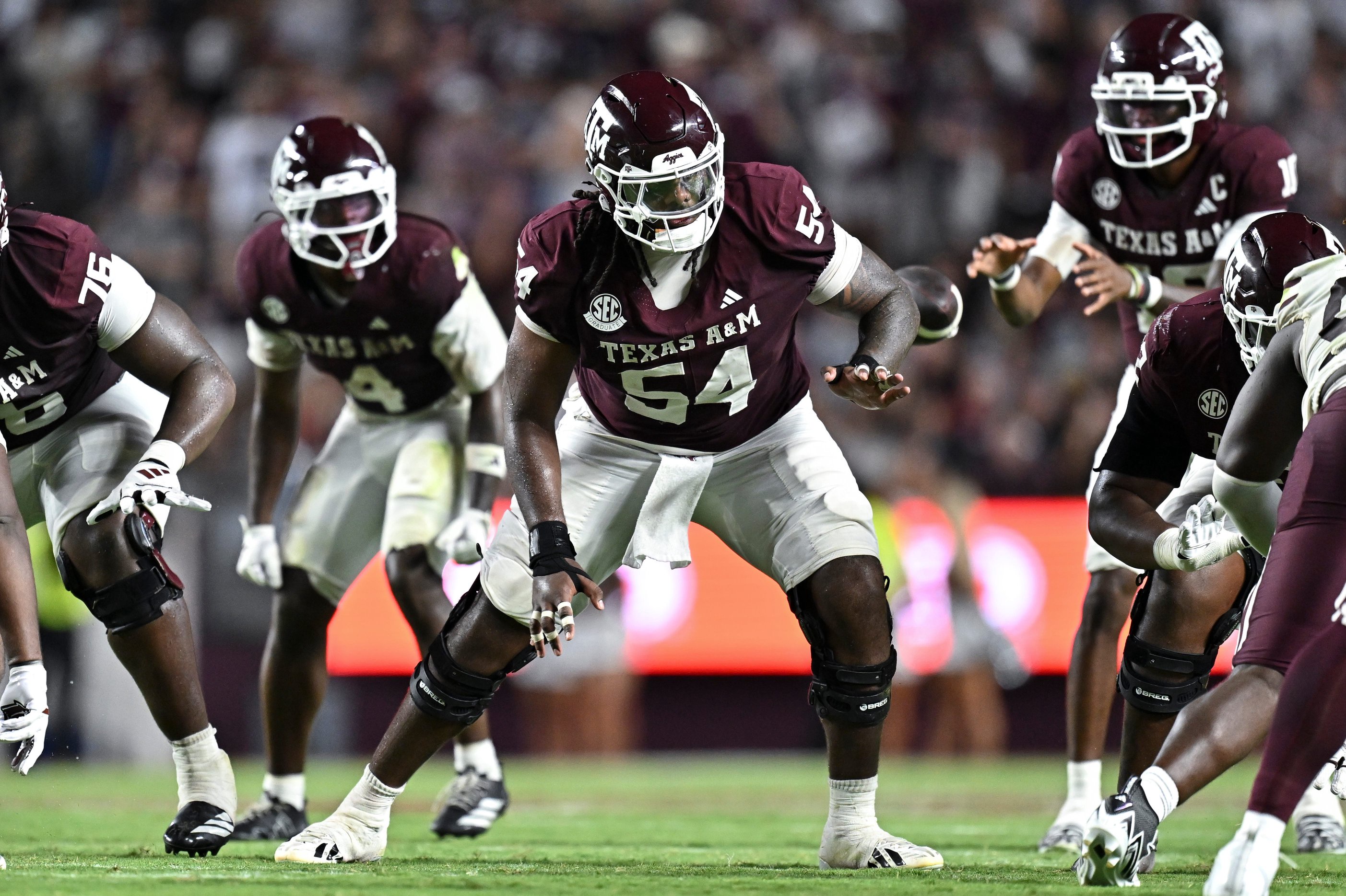 Sep 5, 2026; College Station, Texas, USA; Texas A&amp;M Aggies offensive lineman Mark Nabou Jr. (54) blocks during the second half against the Missouri State Bears at Kyle Field. Mandatory Credit: Maria Lysaker-Imagn Images