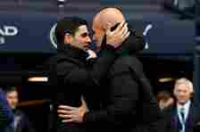 Arsenal manager Mikel Arteta (L) with Manchester City boss Pep Guardiola