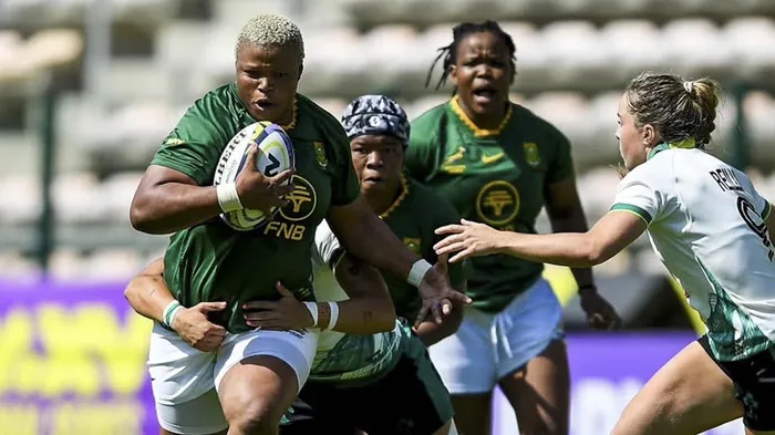 Springbok Women's loose forward Aseza Hele is tackled by an Irish defender in Saturday's WXV Global Series encounter at Athlone Stadium.  