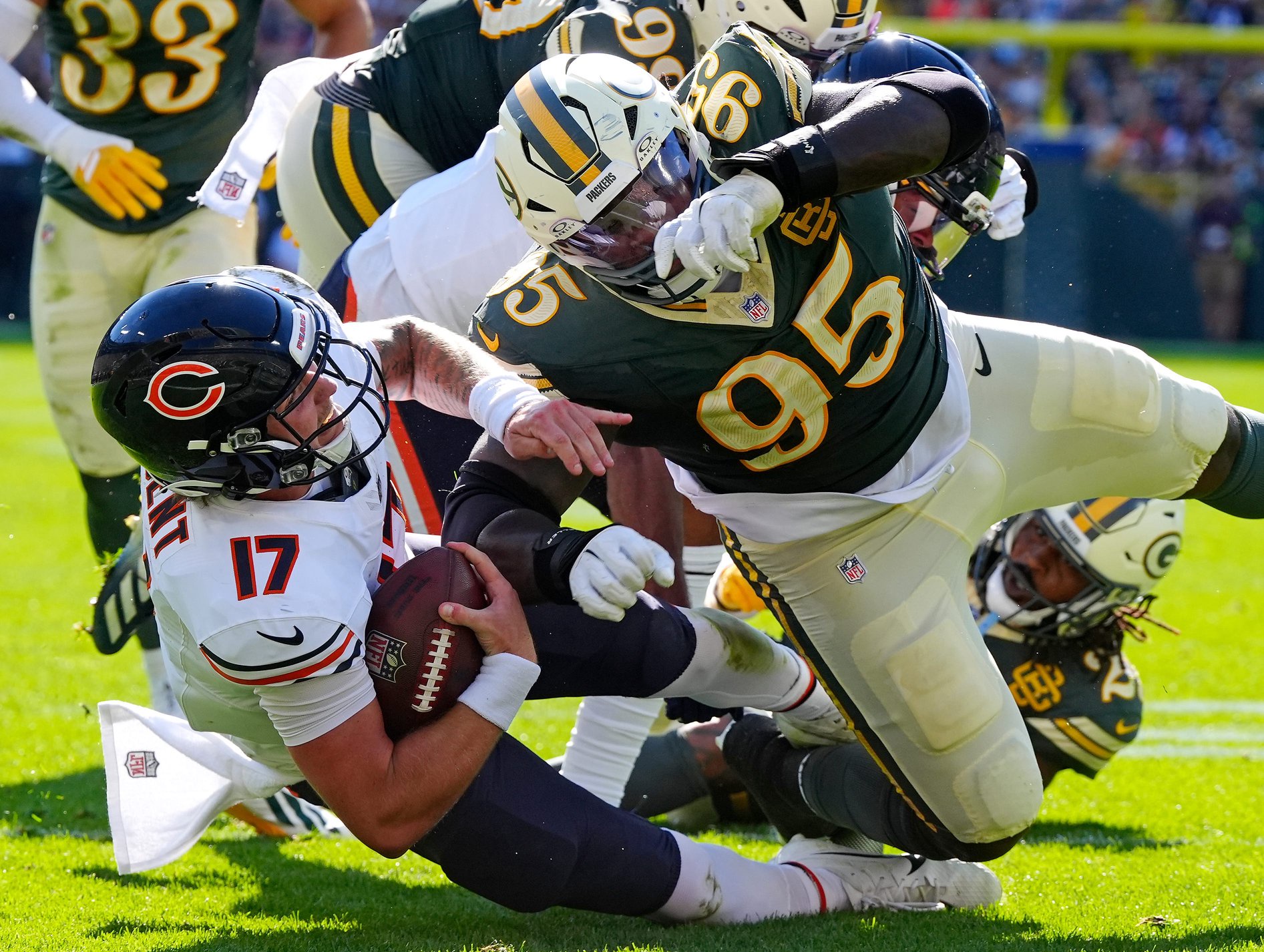 Green Bay Packers defensive tackle Devonte Wyatt (95) tackles Chicago Bears quarterback Tyson Bagent (17) during their football game Sunday, October 11, 2026, at Lambeau Field in Green Bay, Wisconsin.
Wm. Glasheen/Appleton Post-Crescent