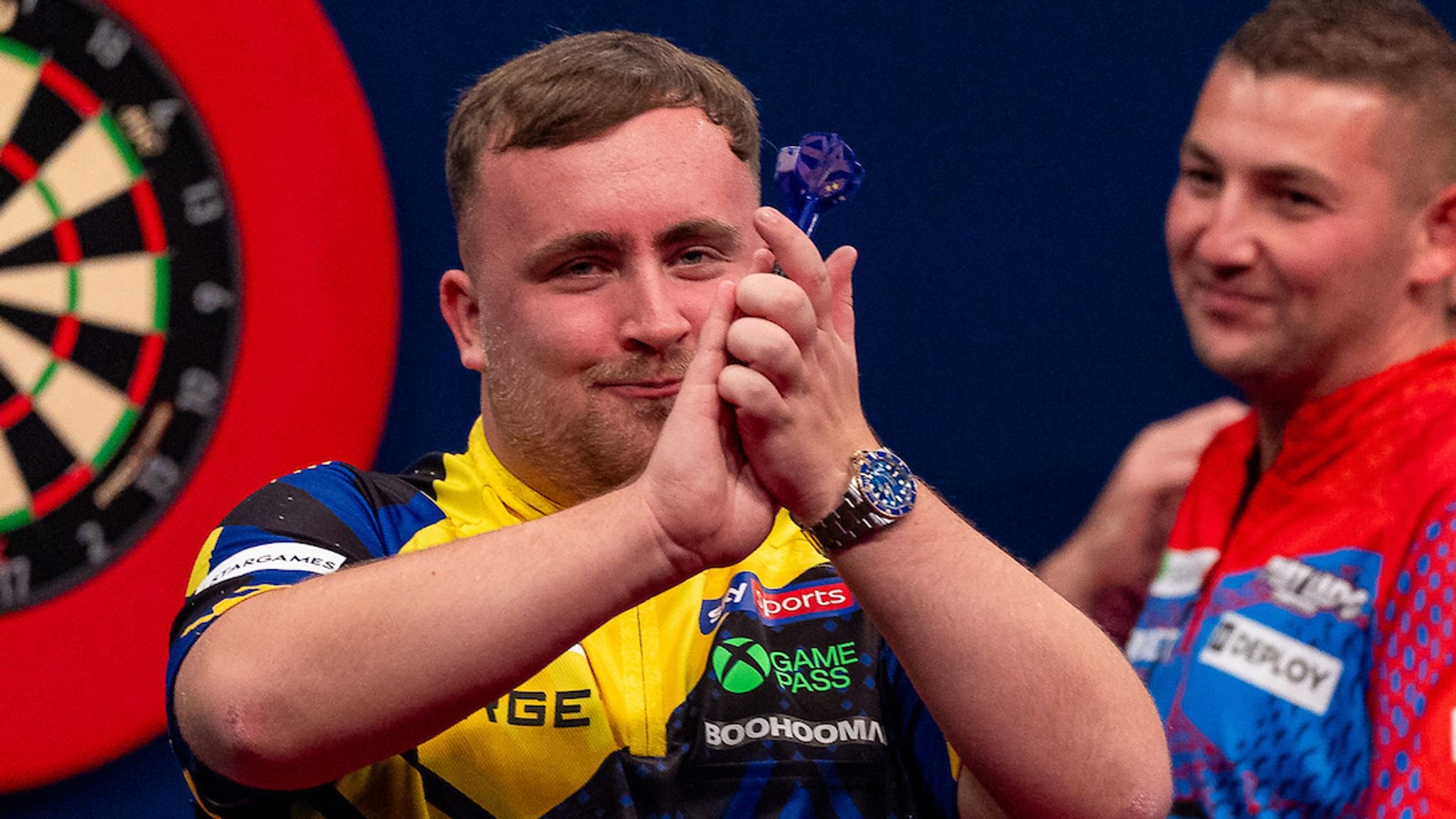 Luke Littler celebrates his win over Nathan Aspinall at the European Championship