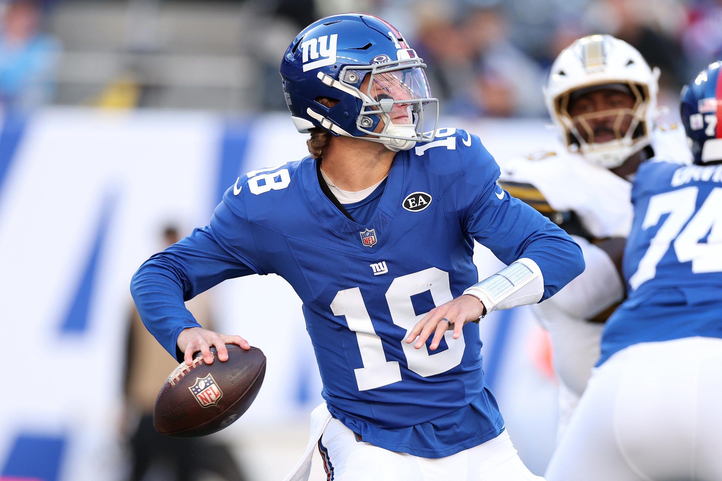 EAST RUTHERFORD, NEW JERSEY - OCTOBER 18: J.J. McCarthy #18 of the New York Giants passes the ball against the New Orleans Saints during the fourth quarter at MetLife Stadium on October 18, 2026 in East Rutherford, New Jersey. (Photo by Al Bello/Getty Images)