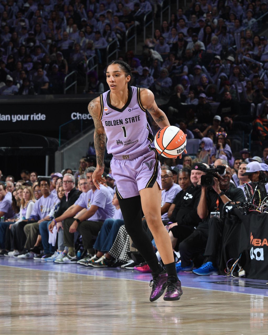 Gabby Williams of the Golden State Valkyries dribbles the ball during the WNBA Finals game against the Atlanta Dream.