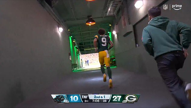Watson ran out onto the field and received a raucous reception at Lambeau Field