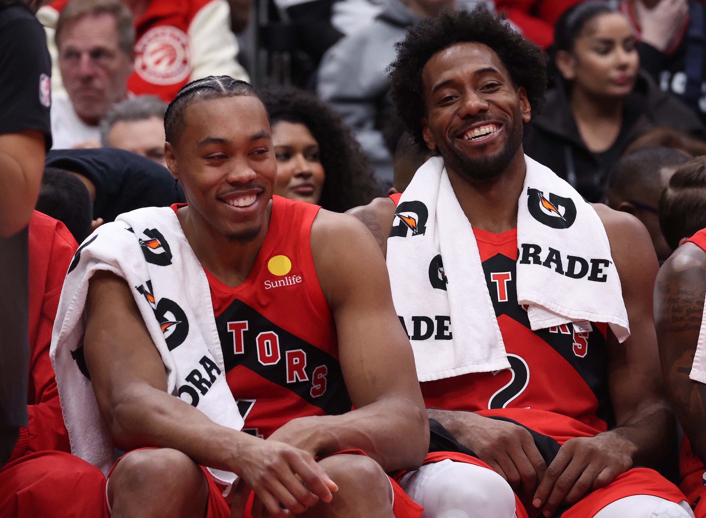 TORONTO, ON- OCTOBER 21  -  Scottie Barnes #4 of the Toronto Raptors and Kawhi Leonard #2 of the Toronto Raptors share a laugh on the bench as the Toronto Raptors play the Chicago Bulls in their season opener at Scotiabank Arena in Toronto. October 21, 2026.  Steve Russell/Toronto Star        (Steve Russell/Toronto Star via Getty Images)