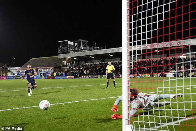 Jay Lynch denies Bruno Guimaraes to help Fleetwood beat Arsenal on penalties (Nick Potts/PA)