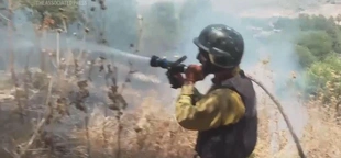 Strikes between Hezbollah and Israel spark fires on both sides of the frontline