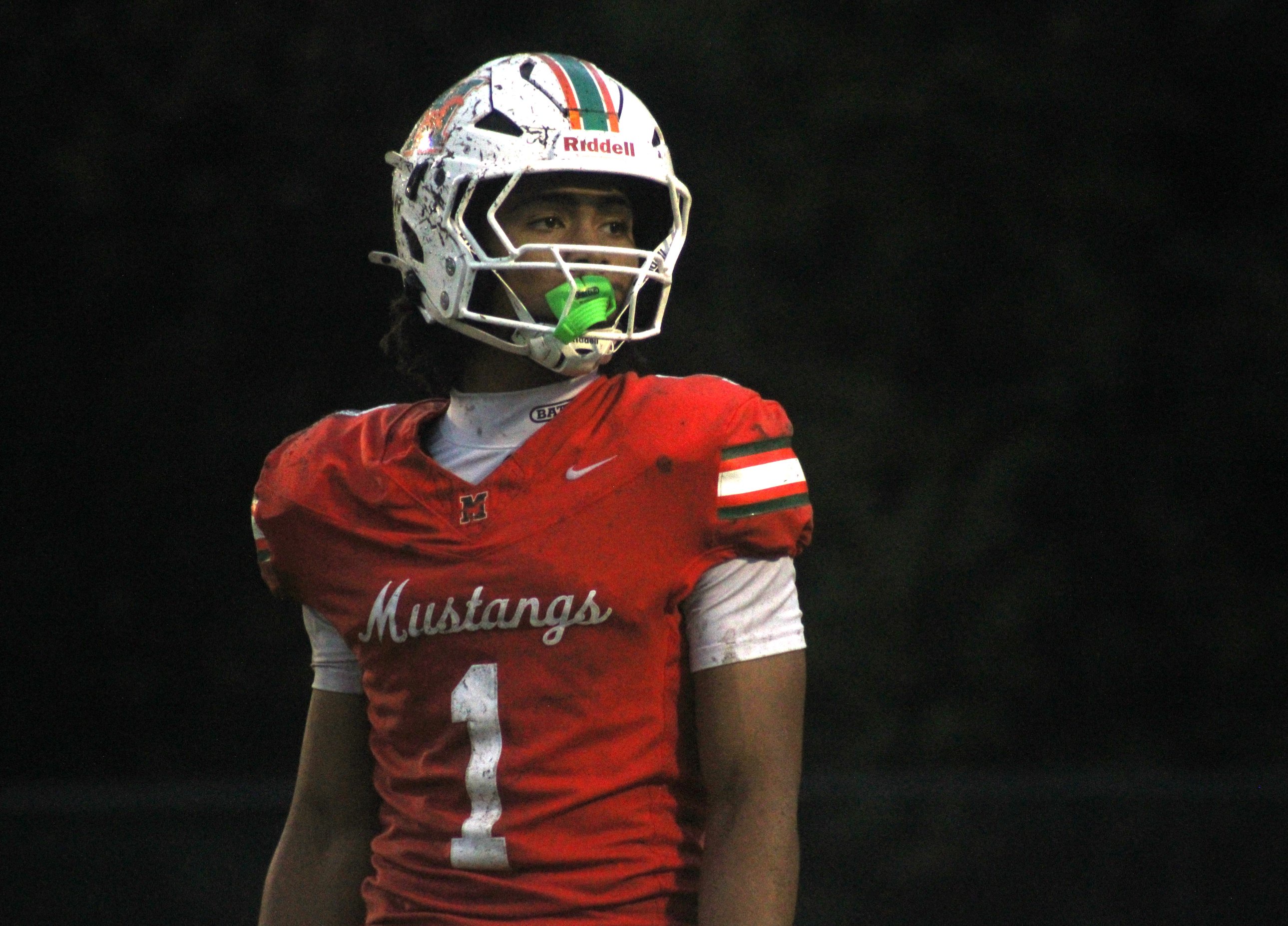 Mandarin receiver Brysen Wright (1) looks to the sideline for a signal during a high school football game against Fletcher on Oct. 10, 2025. [Clayton Freeman/Florida Times-Union]