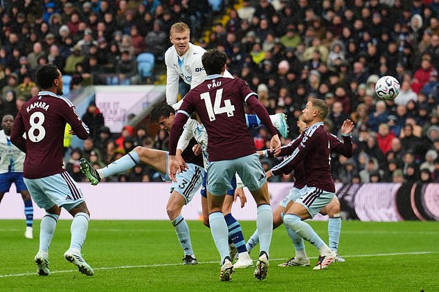 Erling Haaland headed City level in the second half (Martin Rickett/PA)