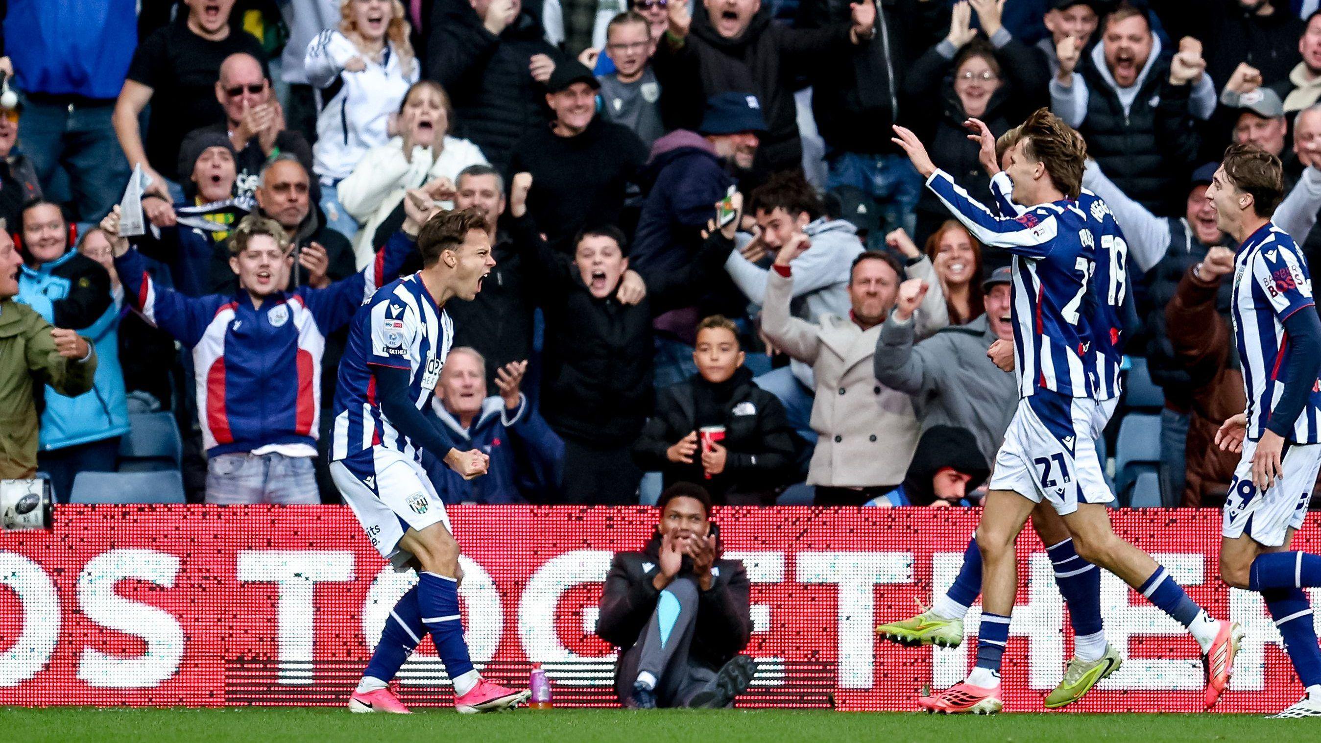 Felix Horn Myhre celebrates his goal with his West Bromwich Albion team-mates during their Championship game against Blackburn Rovers