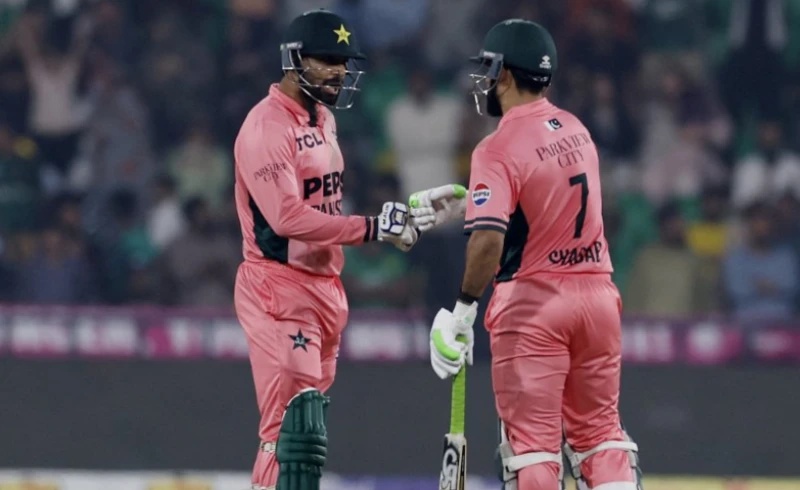 Pakistan's Haris Rauf and Pakistan's Shadab Khan react