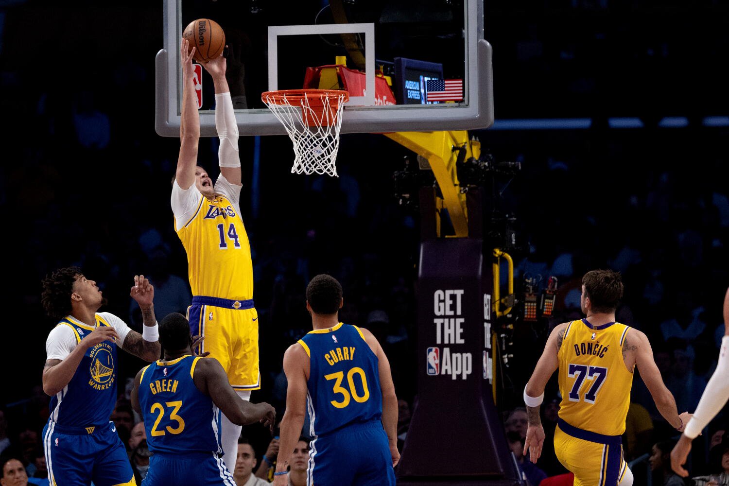 Walker Kessler is about to slam home two points off of a lob from Luka Doncic on Wednesday.
