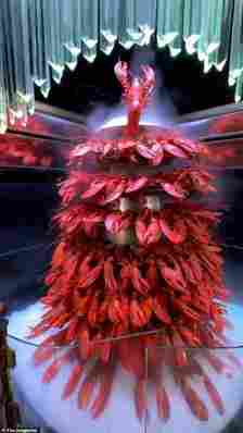 The tower is a multistoreyed Moulin Rouge of vivid pink crustacea, all cloaked in a diaphanous cooling mist