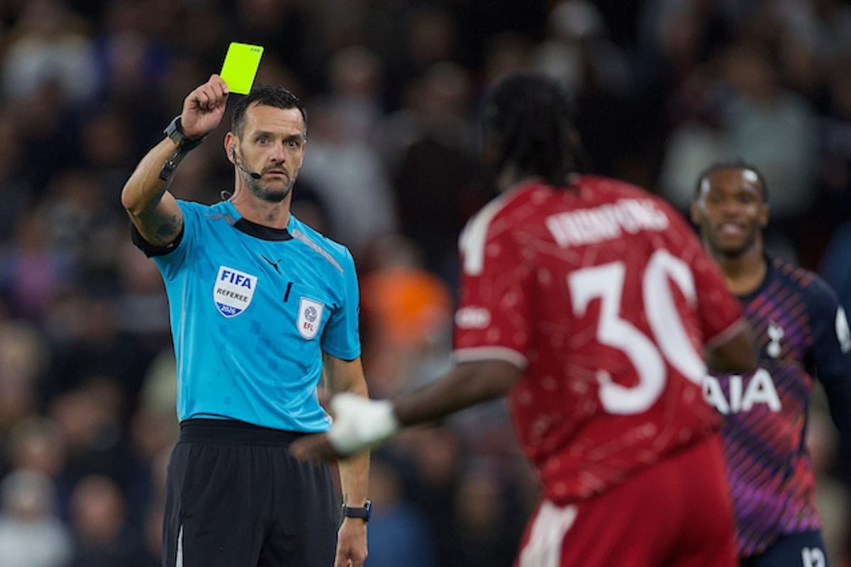 LIVERPOOL, ENGLAND - Tuesday, September 15, 2026: Liverpool's Jeremie Frimpong is shown a yellow card by referee Andrew Madley during the Football League Cup 3rd Round match between Liverpool FC and Tottenham Hotspur FC at Anfield. (Photo by David Rawcliffe/Propaganda)