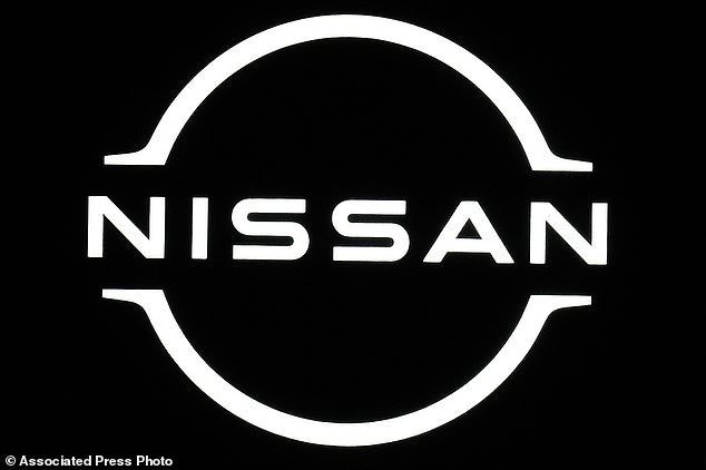 FILE - A Nissan logo is seen at the Japan Motor Show in Tokyo, on Oct. 26, 2023. Nissan's October-December profit plunged to about half of what it earned a year earlier, the t -automaker Thursday, February 8, 2024 , although it stuck to its earlier earnings forecasts.  (AP Photo/Eugene Hoshiko, File)