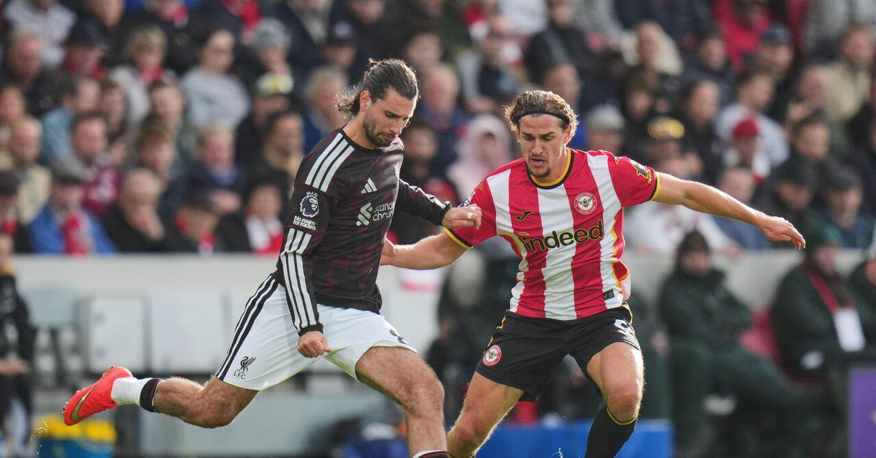 Liverpool's Dominik Szoboszlai, left, kicks the ball ahead of Brentford's Yehor Yarmolyuk during the English Premier League soccer match between Brentford and Liverpool in London, Saturday, Oct. 17, 2026