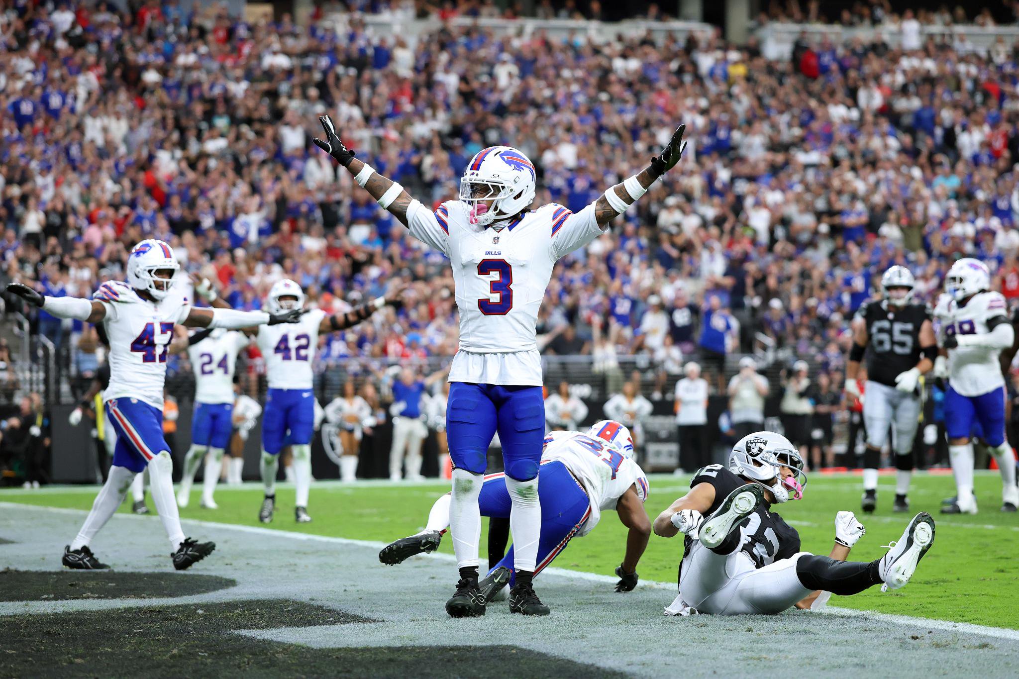 Buffalo Bills player Damar Hamlin (3) celebrates on the field during a game against the Las Vegas Raiders.
