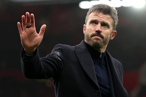 MANCHESTER, ENGLAND - OCTOBER 25: Michael Carrick, Manager of Manchester United, acknowledges the fans after the Premier League 