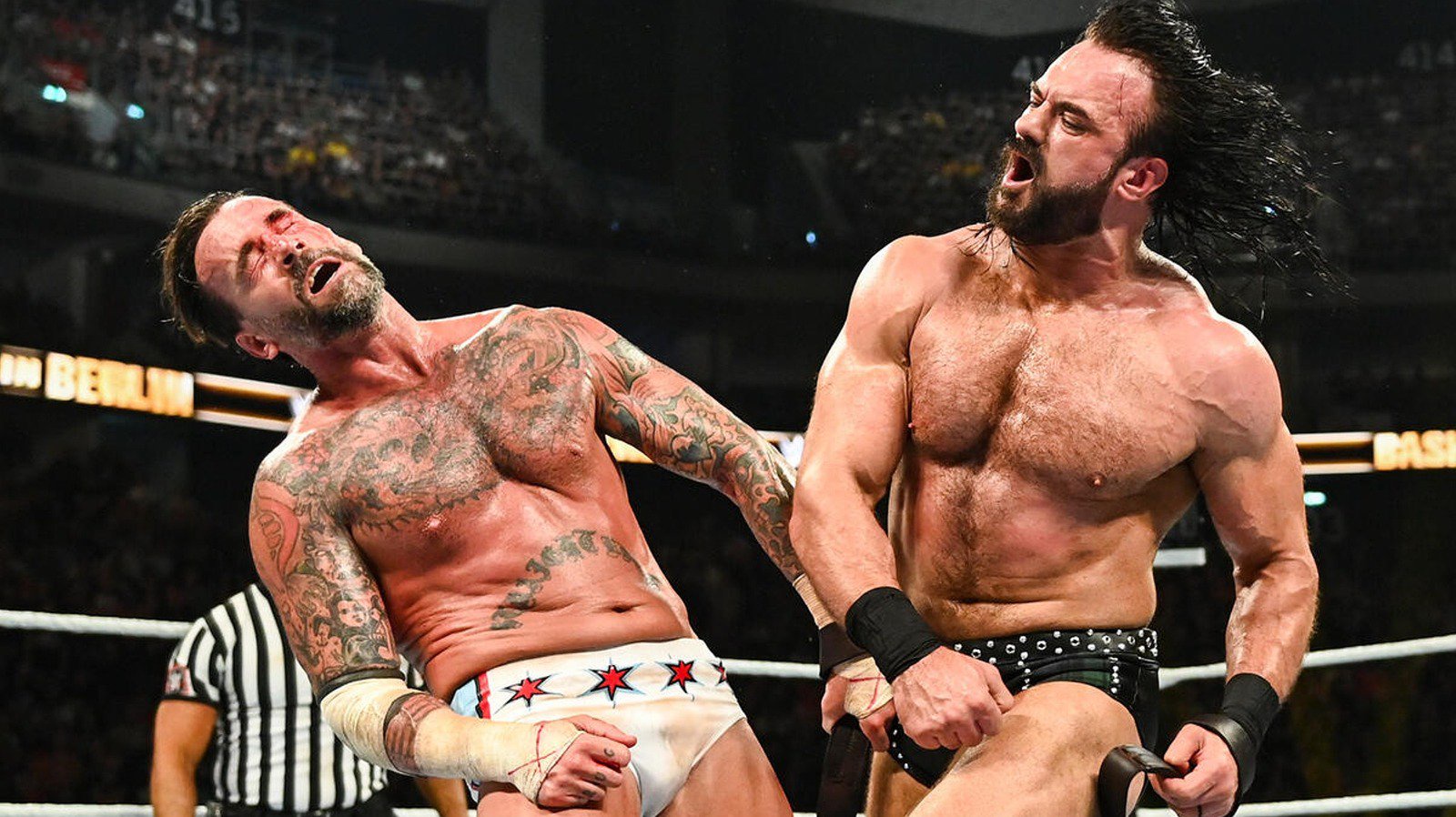 Drew McIntyre and CM Punk clashing during their Bash in Berlin match.