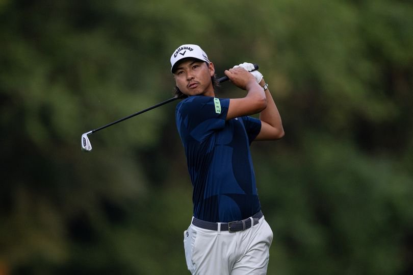 Min Woo Lee hits an iron shot