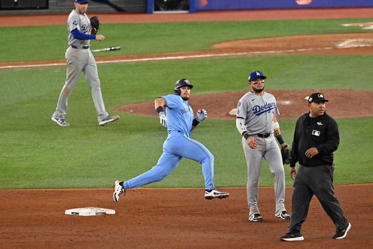 TORONTO, ON - OCTOBER 31: Addison Barger #47 of the Toronto Blue Jays doubles in the ninth inning during Game Six of the 2025 World Series presented by Capital One between the Los Angeles Dodgers and the Toronto Blue Jays at Rogers Centre on Friday, October 31, 2025 in Toronto, Ontario, Canada. (Photo by Jon Blacker/MLB Photos via Getty Images)