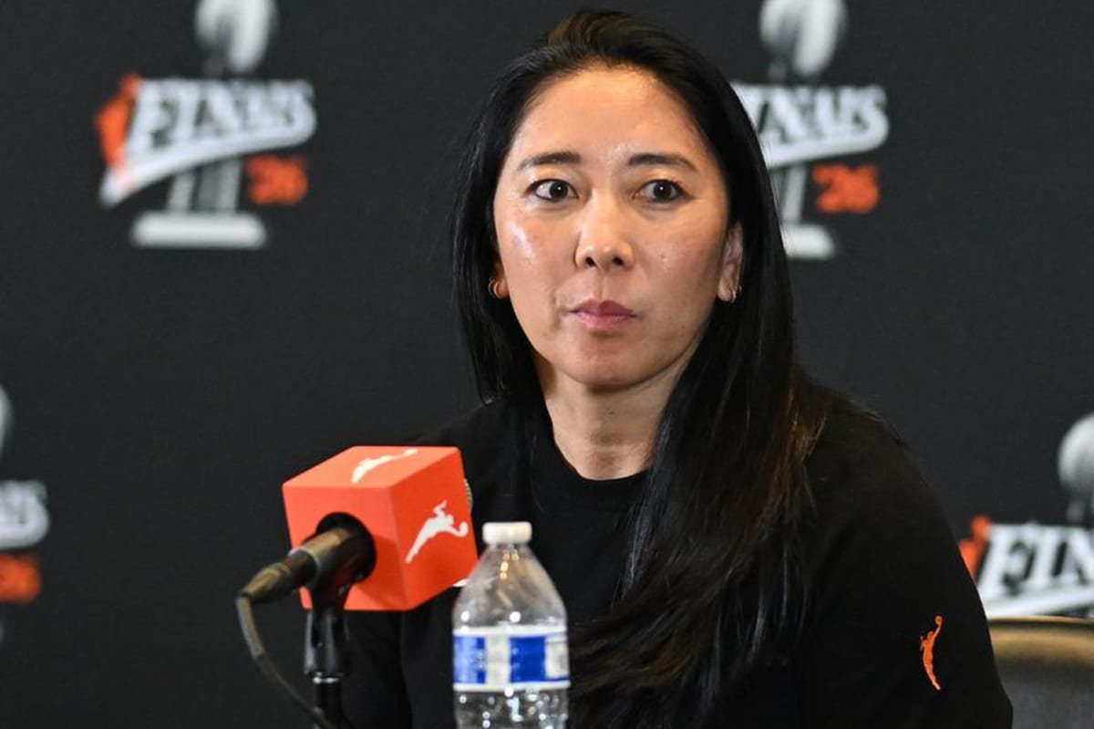 Natalie Nakase speaks to the media
