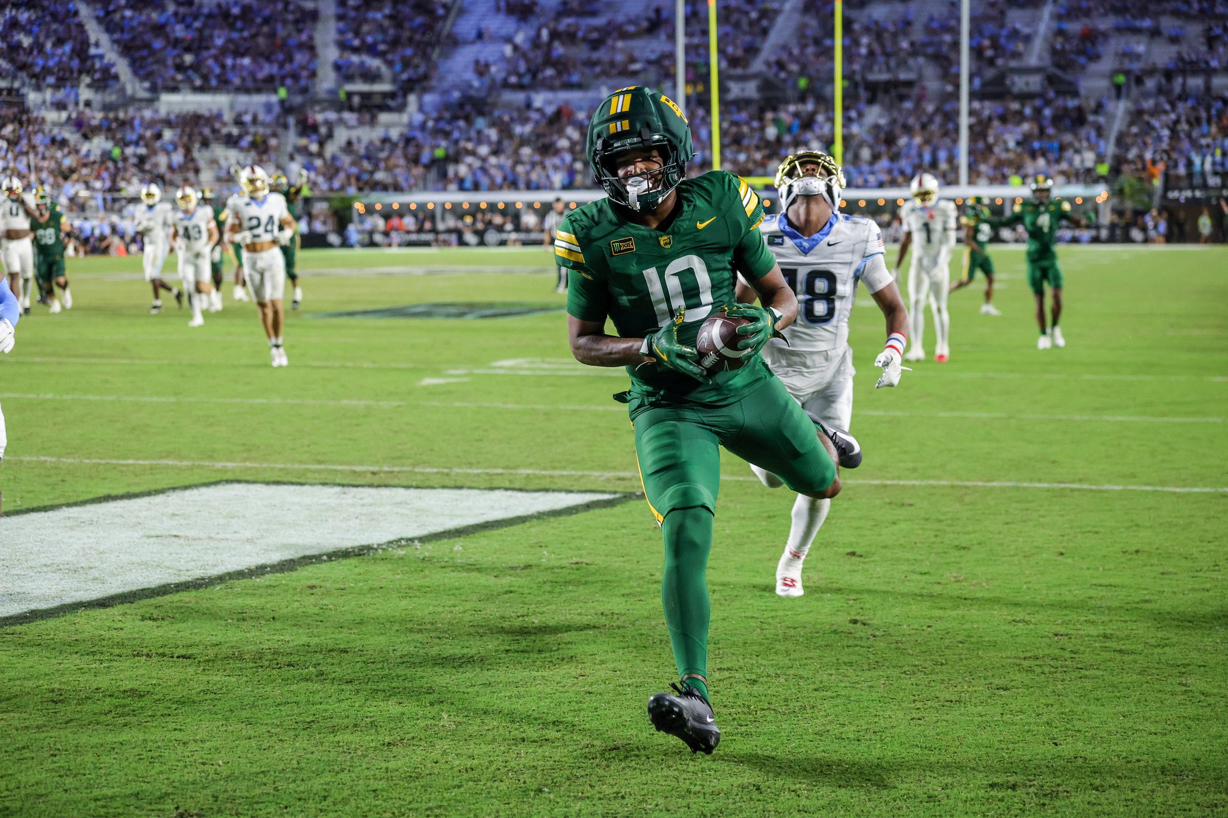 Oct 30, 2026; Orlando, Florida, USA;  Baylor Bears tight end Tony Livingston (10) scores a touchdown during the second half against the Central Florida Knights at Acrisure Bounce House.  Mandatory Credit: Mike Watters-Imagn Images
