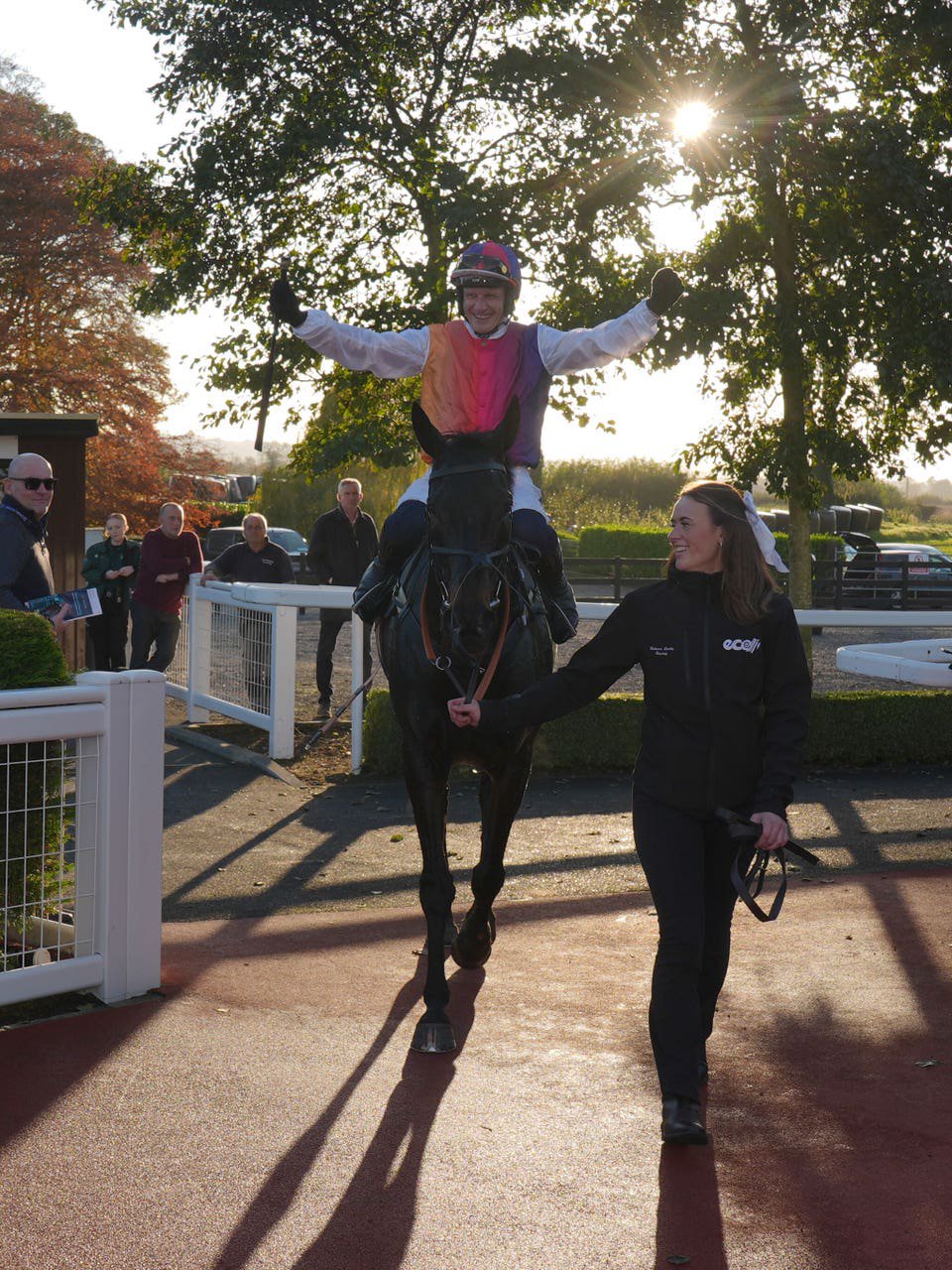 Paul Townend celebrates on the way to the winner's enclosure