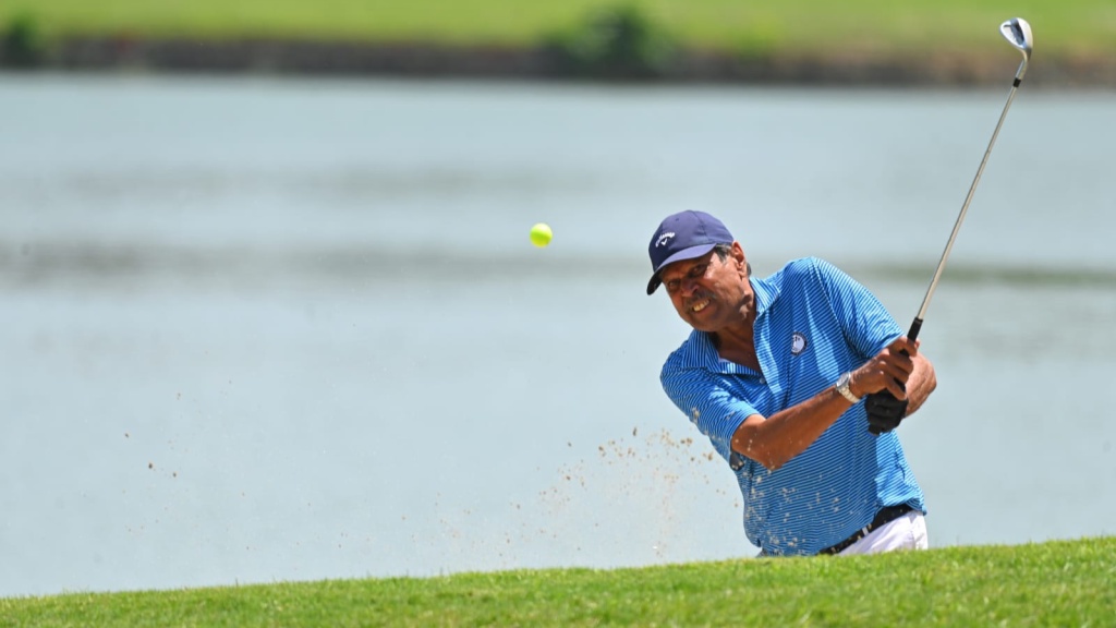PGTI president Kapil Dev in action playing golf. (Special Arrangement)
