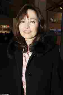 Executive assistant to Donald Trump Rhona Graff poses for photos in the lobby of the main tent during Olympus Fashion Week Fall 2005 at Bryant Park February 10, 2005 in New York City