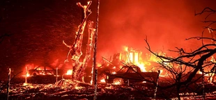California firefighters battle wind-driven wildfire east of San Francisco overnight