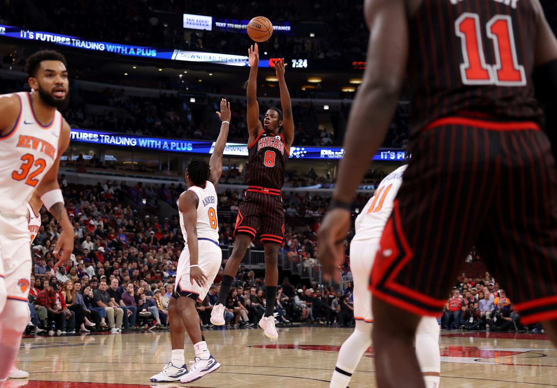 Chicago Bulls forward Caleb Wilson (8) shoots a jumper in the first half of a game against the New York Knicks at the United Center in Chicago on Oct. 28, 2026. (Chris Sweda/Chicago Tribune)
