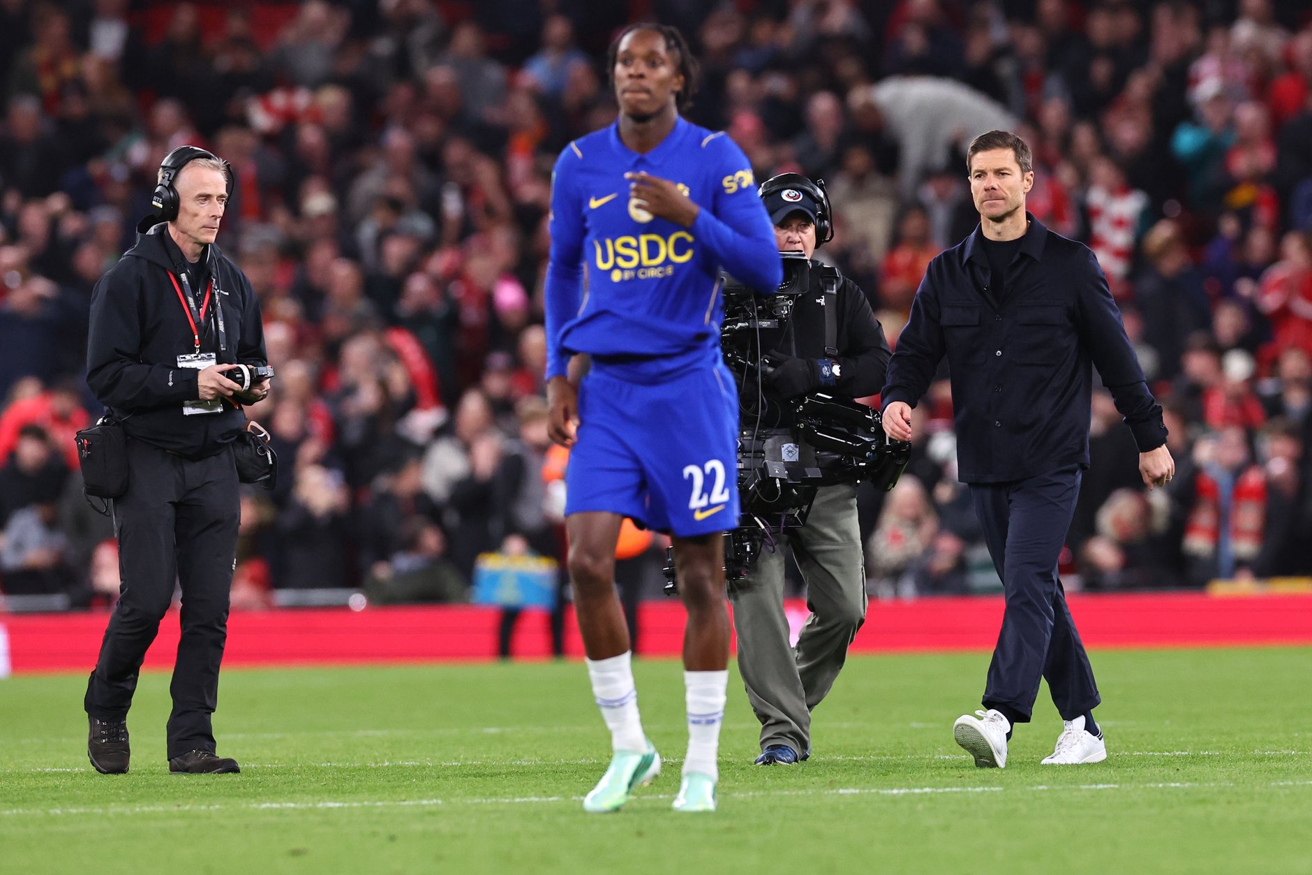 Emmanuel Emegha and Xabi Alonso look on after Chelsea's loss to Liverpool