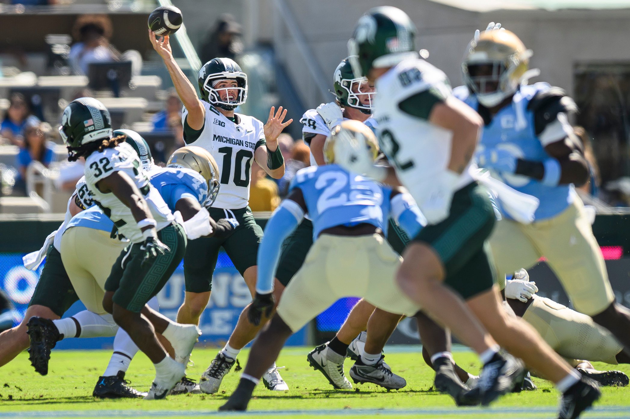 Michigan State quarterback Kayd Coffman attempts a pass during the first half against UCLA.