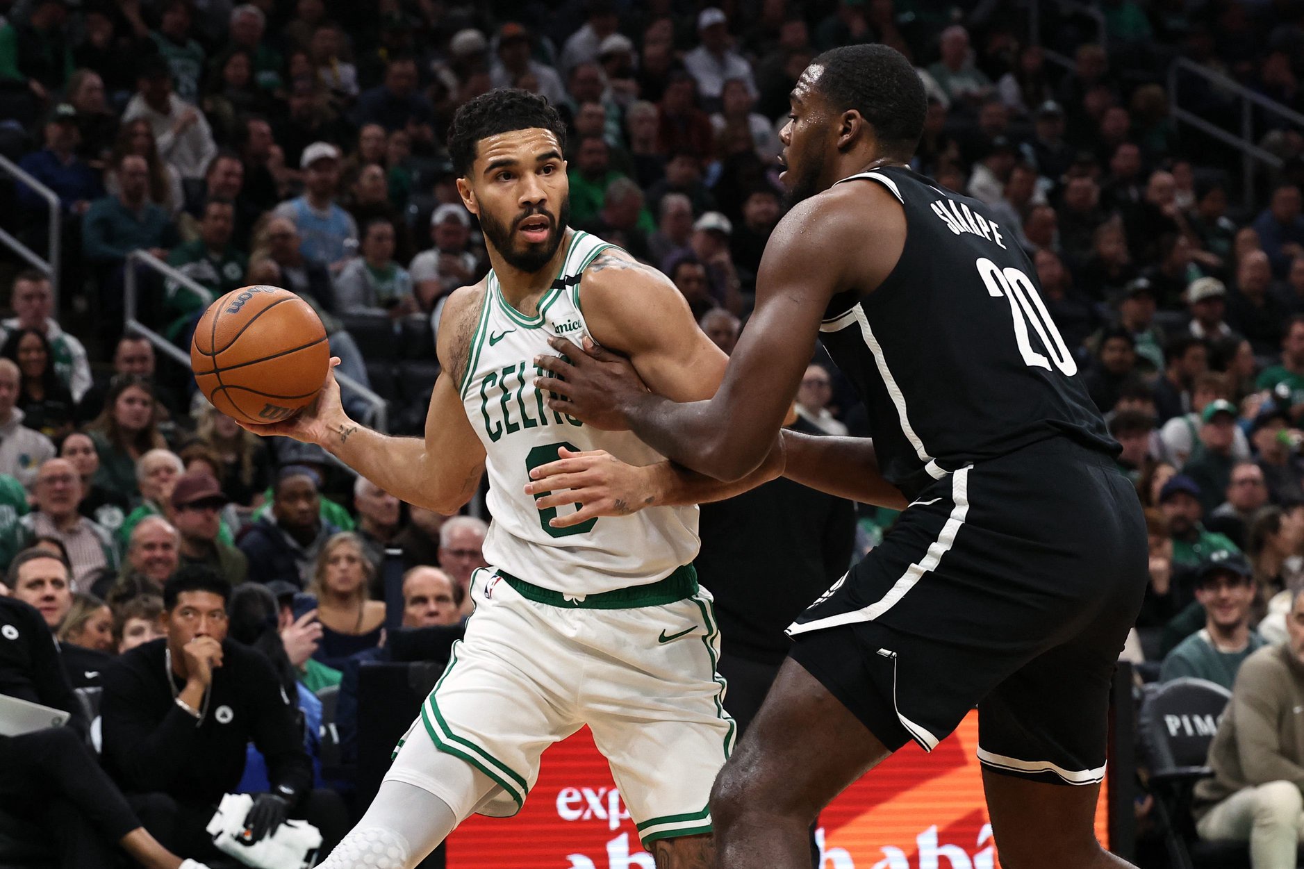 Oct 27, 2026; Boston, Massachusetts, USA; Brooklyn Nets center Day'ron Sharpe (20) defends against Boston Celtics forward Jayson Tatum (0) during the first quarter at TD Garden. Mandatory Credit: Winslow Townson-Imagn Images