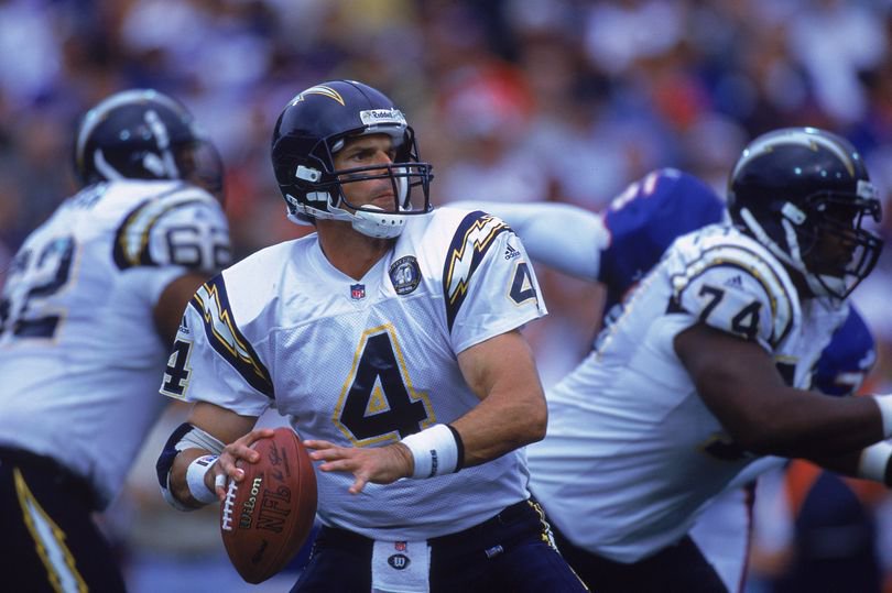 Jim Harbaugh #4 of the San Diego Chargers drops back to pass the ball during the game against the Buffalo Bills at the Ralph Wilson Stadium in Orchard Park, New York. The Bills defeated the Chargers 27-24