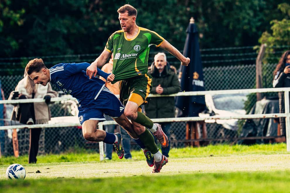 Lye Town's Alfie Didlock is brought down during the 6-5 thriller against AFC Wolverhampton City won by Lye.